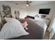 This bedroom offers natural light from the window and stylish wood-look vinyl floors at 14963 Yorkshire Run Dr, Orlando, FL 32828