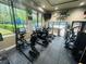 Community fitness center with cardio machines and inspiring art at 14963 Yorkshire Run Dr, Orlando, FL 32828