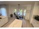 Bright breakfast nook overlooking the private pool, perfect for casual dining with natural light at 14963 Yorkshire Run Dr, Orlando, FL 32828