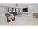 Inviting living room with a comfortable sofa, a large television, and bright, neutral walls at 1557 Alligator St, St Cloud, FL 34771
