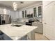 Contemporary kitchen with marble countertops, stainless steel appliances, and plenty of cabinet space at 1574 Thetford Cir, Orlando, FL 32824