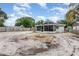 Large backyard featuring a fire pit area, perfect for outdoor gatherings and enjoying evenings at 1622 Crystalview Trl, Lakeland, FL 33801