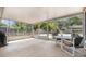 Enjoy a screened-in porch with ample space for seating and relaxation in this beautiful outdoor retreat at 1622 Crystalview Trl, Lakeland, FL 33801