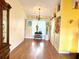 Dining room featuring laminate wood flooring, natural light and yellow colored walls at 1820 Hallcrest Dr, Deltona, FL 32725