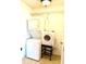 Functional laundry room with stacked washer and dryer units at 1820 Hallcrest Dr, Deltona, FL 32725