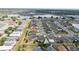 Aerial view of a Gathering-friendly community featuring a mix of single-Gathering homes and natural ponds at 1821 Cayman Cove St., St Cloud, FL 34772