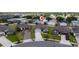 Aerial view of a charming single-Gathering home surrounded by well-manicured lawns in a suburban neighborhood at 1821 Cayman Cove St., St Cloud, FL 34772