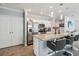 Well-appointed kitchen featuring an island with barstool seating and pendant lighting at 2281 Canyon Breeze Ave, Kissimmee, FL 34746