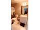 Full bathroom featuring a toilet, vanity, and decorative lighting at 242 Abbotsbury Dr, Kissimmee, FL 34758