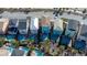 Aerial view showcasing colorful homes with private pools, landscaping, and driveways, offering a modern suburban lifestyle at 2938 Salted Rim Rd, Kissimmee, FL 34747