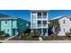 Charming three-story home with double balconies and well-maintained landscaping at 2938 Salted Rim Rd, Kissimmee, FL 34747