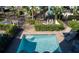 Refreshing pool area with comfortable lounge chairs and beautiful landscaping at 2938 Salted Rim Rd, Kissimmee, FL 34747