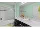Bathroom with a single vanity, quartz counters and a shower/tub combo at 3084 Slough Creek Dr, Kissimmee, FL 34744