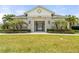 The community pool is located in a stone building with beautiful landscaping at 3084 Slough Creek Dr, Kissimmee, FL 34744