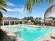 Community pool with plentiful lounge seating, shade cabana, and playground at 3084 Slough Creek Dr, Kissimmee, FL 34744