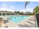 Community pool with ample lounge seating, cabana and fenced for privacy at 3084 Slough Creek Dr, Kissimmee, FL 34744