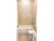 Cozy bathroom featuring white tiling and a shower and tub at 318 Cocoa Ct, Kissimmee, FL 34758
