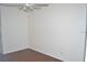 Cozy bedroom with hardwood flooring and a ceiling fan at 3214 Rio Grande Trl # 1, Kissimmee, FL 34741