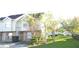 Charming townhouse with manicured lawn and mature trees at 3214 Rio Grande Trl # 1, Kissimmee, FL 34741