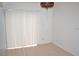Bright, neutral room with tile flooring and sliding glass doors at 3214 Rio Grande Trl # 1, Kissimmee, FL 34741