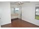 Spacious main bedroom with hardwood flooring, bathroom and ceiling fan at 3214 Rio Grande Trl # 1, Kissimmee, FL 34741