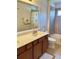 Well-lit bathroom with a double vanity and tub-shower combination at 3341 Pawleys N Loop, St Cloud, FL 34769