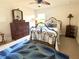 Comfortable bedroom with furniture, a ceiling fan, and natural light at 3341 Pawleys N Loop, St Cloud, FL 34769