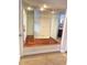 Entryway featuring a unique mirrored alcove with wood flooring, adding visual interest at 3341 Pawleys N Loop, St Cloud, FL 34769
