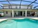 Outdoor patio features a pool with lots of seating, and fans for summer activities at 3341 Pawleys N Loop, St Cloud, FL 34769