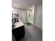 Modern bathroom featuring a glass-enclosed shower, a vanity and tile flooring at 3920 Southern Vista Loop, St Cloud, FL 34772