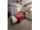 Modern bedroom with decorative wall art, and stylish decor for relaxation at 3920 Southern Vista Loop, St Cloud, FL 34772