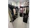 Spacious walk-in closet with ample storage, shelving, rods, and shoe racks for organized living at 3920 Southern Vista Loop, St Cloud, FL 34772