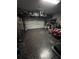 Spacious garage with speckled flooring and ample storage; a versatile space at 3920 Southern Vista Loop, St Cloud, FL 34772