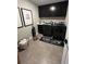 Well-equipped laundry room with modern appliances, cabinetry, and decorative touches at 3920 Southern Vista Loop, St Cloud, FL 34772