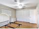 Bright bedroom with natural light, featuring hardwood floors and plenty of storage, creating a comfortable space at 401 Maryland Ave, St Cloud, FL 34769