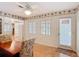 Inviting dining room with easy access to the kitchen and outdoor areas, enhancing everyday living at 401 Maryland Ave, St Cloud, FL 34769