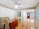 Spacious dining area with hardwood floors and built-in features, great for entertaining at 401 Maryland Ave, St Cloud, FL 34769
