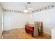 Cozy dining area with hardwood floors and stylish chairs, perfect for intimate meals at 401 Maryland Ave, St Cloud, FL 34769
