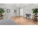 Bedroom featuring wood floors, neutral paint, ceiling fan and a twin bed at 430 Bywater Dr, Orlando, FL 32839