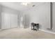 Spacious bedroom offering plush carpet, and a large double door closet at 430 Bywater Dr, Orlando, FL 32839
