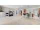 Open-concept living area with views of the kitchen, dining room, and front entry at 430 Bywater Dr, Orlando, FL 32839