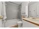 Full bathroom featuring tiled shower, vanity, and toilet at 4700 Buggywhip Ln # 102, Orlando, FL 32812