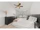 Bright bedroom with vaulted ceiling, ceiling fan, and large window at 4700 Buggywhip Ln # 102, Orlando, FL 32812