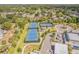 Overhead view of two tennis courts, perfect for recreational activities at 503 Gumwood Ct, Altamonte Springs, FL 32714
