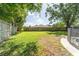 Large, grassy backyard with a privacy fence; perfect for outdoor activities at 503 Gumwood Ct, Altamonte Springs, FL 32714