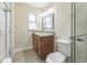 This bathroom features granite countertops, a vanity cabinet, and a shower with glass door at 503 Gumwood Ct, Altamonte Springs, FL 32714