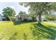 Well-maintained home with verdant lawn, complemented by charming landscaping with plenty of healthy plants at 503 Gumwood Ct, Altamonte Springs, FL 32714