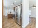 Kitchen featuring stainless appliances, granite countertops, wood cabinets and wood flooring at 503 Gumwood Ct, Altamonte Springs, FL 32714