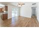 Open concept living room showcasing new floors and sliding door to backyard at 503 Gumwood Ct, Altamonte Springs, FL 32714