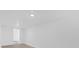 Basement area featuring white walls and recessed lights at 5851 Se Drew Rd, Belleview, FL 34420